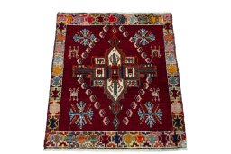 Surface texture of 2000s Shiraz rug with natural Wool and intricate pattern
