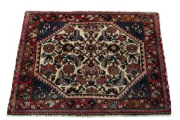 Surface texture of 2000s Shiraz rug with natural Wool and intricate pattern