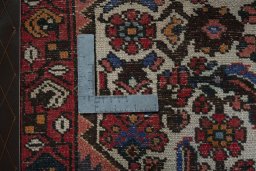 Backside of handmade 2000s Shiraz rug showing knot structure and weave density