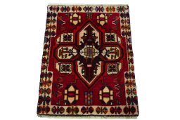 Surface texture of 2000s Shiraz rug with natural Wool and intricate pattern