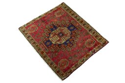 Corner detail of 2000s Shiraz rug showing border pattern and Wool pile