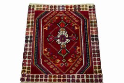 Surface texture of 2000s Shiraz rug with natural Wool and intricate pattern