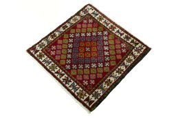 Corner detail of 2000s Shiraz rug showing border pattern and Wool pile