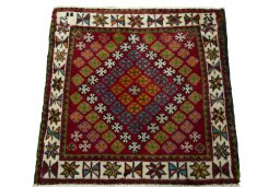 Surface texture of 2000s Shiraz rug with natural Wool and intricate pattern