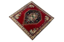 Corner detail of 2000s Shiraz rug showing border pattern and Wool pile