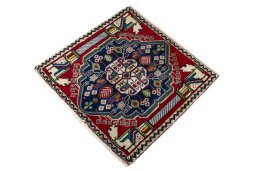 Corner detail of 2000s Shiraz rug showing border pattern and Wool pile
