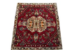 Surface texture of 2000s Shiraz rug with natural Wool and intricate pattern