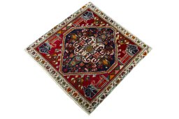 Corner detail of 2000s Shiraz rug showing border pattern and Wool pile
