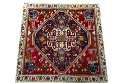 Surface texture of 2000s Shiraz rug with natural Wool and intricate pattern