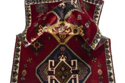 Corner detail of 2000s Shiraz rug showing border pattern and Wool pile