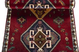 Full view of 2000s Shiraz rug from Iran / Persia, 135 × 80 cm in Red tones