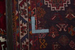 Close-up detail of 2000s Shiraz rug from Iran / Persia showing Wool weave