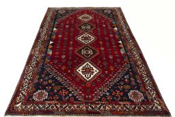 Surface texture of 2000s Shiraz rug with natural Wool and intricate pattern