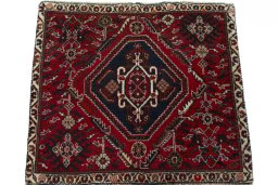 Surface texture of 2000s Shiraz rug with natural Wool and intricate pattern
