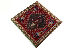 Corner detail of 2000s Shiraz rug showing border pattern and Wool pile