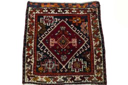 Surface texture of 2000s Shiraz rug with natural Wool and intricate pattern