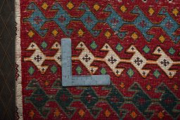 Backside of handmade 2000s Shiraz rug showing knot structure and weave density