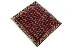 Corner detail of 2000s Shiraz rug showing border pattern and Wool pile