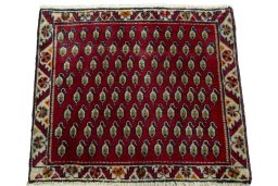 Surface texture of 2000s Shiraz rug with natural Wool and intricate pattern