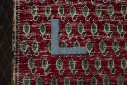 Backside of handmade 2000s Shiraz rug showing knot structure and weave density