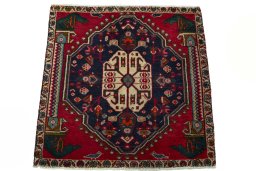 Surface texture of 2000s Shiraz rug with natural Wool and intricate pattern