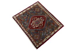 Corner detail of 2000s Shiraz rug showing border pattern and Wool pile