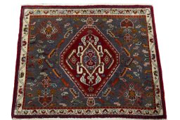 Surface texture of 2000s Shiraz rug with natural Wool and intricate pattern