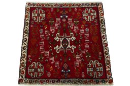 Surface texture of 2000s Shiraz rug with natural Wool and intricate pattern