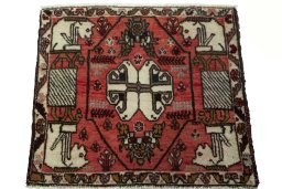 Surface texture of 2000s Shiraz rug with natural Wool and intricate pattern
