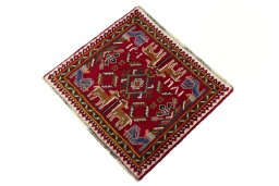Corner detail of 2000s Shiraz rug showing border pattern and Wool pile