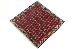Corner detail of 2000s Shiraz rug showing border pattern and Wool pile