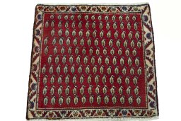 Surface texture of 2000s Shiraz rug with natural Wool and intricate pattern