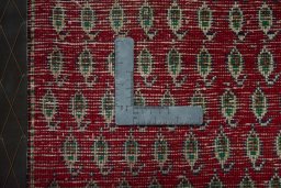 Backside of handmade 2000s Shiraz rug showing knot structure and weave density