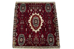 Surface texture of 2000s Shiraz rug with natural Wool and intricate pattern