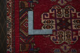 Backside of handmade 2000s Shiraz rug showing knot structure and weave density