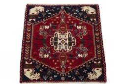 Surface texture of 2000s Shiraz rug with natural Wool and intricate pattern
