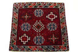 Surface texture of 2000s Shiraz rug with natural Wool and intricate pattern