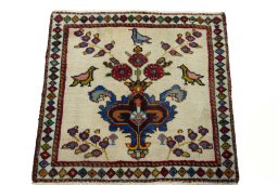 Surface texture of 2000s Shiraz rug with natural Wool and intricate pattern