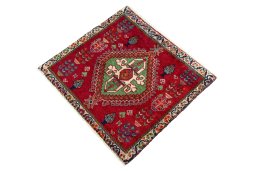 Corner detail of 2000s Shiraz rug showing border pattern and Wool pile