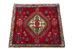 Surface texture of 2000s Shiraz rug with natural Wool and intricate pattern