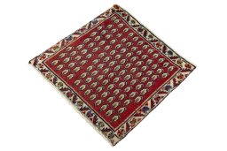 Corner detail of 2000s Shiraz rug showing border pattern and Wool pile
