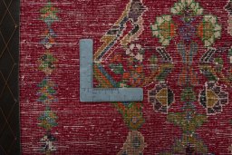 Backside of handmade 2000s Shiraz rug showing knot structure and weave density