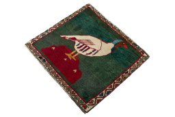 Corner detail of 2000s Shiraz rug showing border pattern and Wool pile