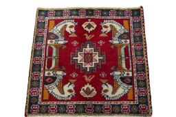 Surface texture of 2000s Shiraz rug with natural Wool and intricate pattern