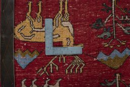Backside of handmade 2000s Shiraz rug showing knot structure and weave density