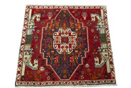 Surface texture of 2000s Shiraz rug with natural Wool and intricate pattern