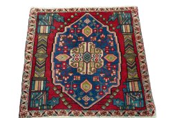 Surface texture of 2000s Shiraz rug with natural Wool and intricate pattern