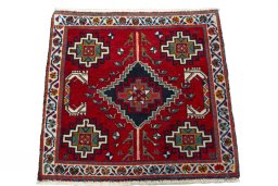 Surface texture of 2000s Shiraz rug with natural Wool and intricate pattern