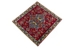 Corner detail of 2000s Shiraz rug showing border pattern and Wool pile