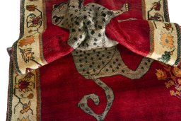 Corner detail of 2000s Shiraz rug showing border pattern and Wool pile